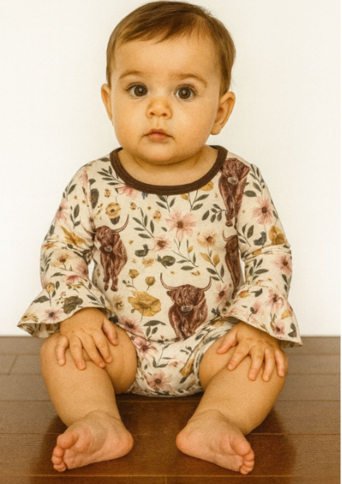 MontanaCo Highland Cow Ruffle Sleeve Infant Onesie LR0001